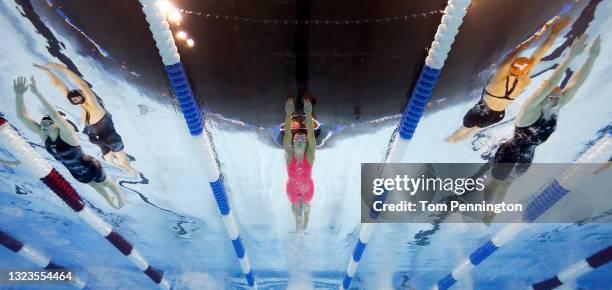 Julia Poole of the United States, Abigail Herscu of the United States and Alexis Yager of the United States compete in a preliminary heat for the...