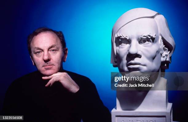 Portrait of artist Gerald Laing with one of his sculptures , November 1988.