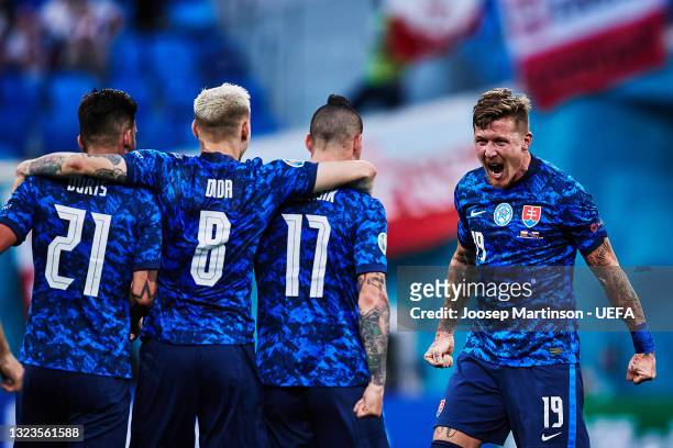Juraj Kucka of Slovakia celebrates with team mates after the final whistle during the UEFA Euro 2020 Championship Group E match between Poland and...