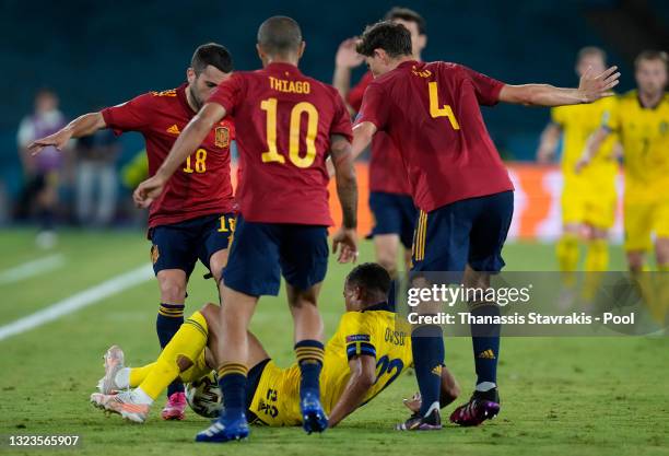 Robin Quaison of Sweden is challenged by Jordi Alba, Thiago Alcantara and Pau Torres of Spain during the UEFA Euro 2020 Championship Group E match...