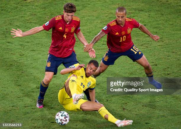 Pau Torres of Spain and Thiago Alcantara of Spain competes for the ball with Robin Quaison of Sweden during the UEFA Euro 2020 Championship Group E...