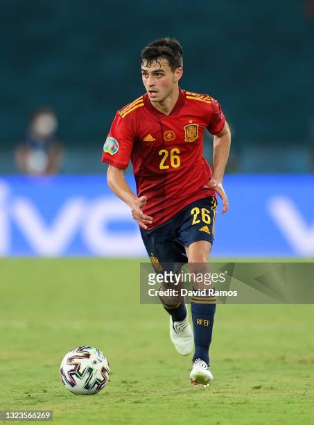 Pedri of Spain runs with the ball during the UEFA Euro 2020 Championship Group E match between Spain and Sweden at the La Cartuja Stadium on June 14,...