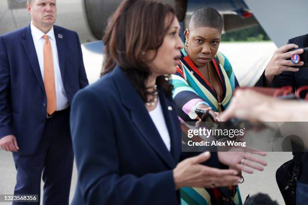 Vice President Kamala Harris speaks to members of the press as her press secretary Symone D. Sanders looks on at Greenville-Spartanburg International...