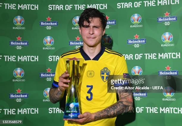 Victor Lindeloef of Sweden poses for a photograph with their Heineken "Star of the Match" award after the UEFA Euro 2020 Championship Group E match...
