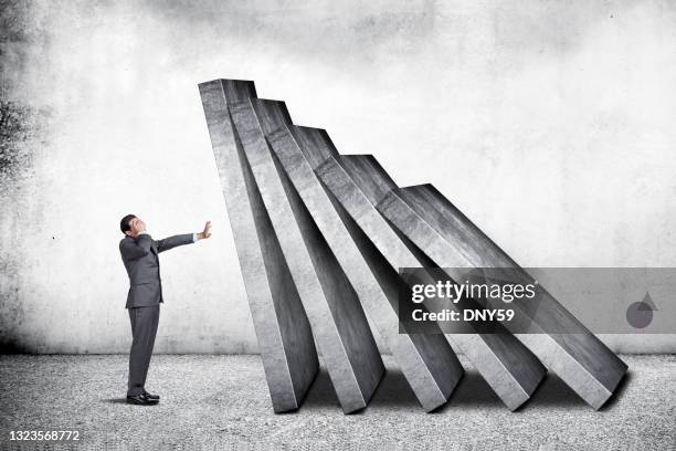 businessman prepares for the worst - idade humana imagens e fotografias de stock