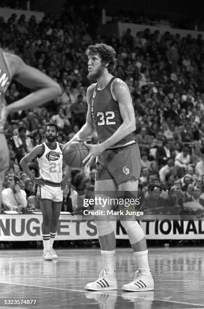 Portland Trail Blazers center Bill Walton collects himself prior to a free throw during an NBA basketball game against the Denver Nuggets at...