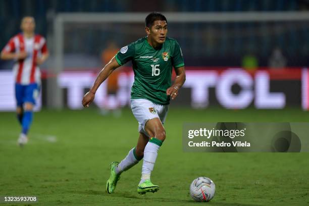 Erwin Saavedra of Bolivia controls the ball during a Group A match between Paraguay and Bolivia at Estádio Olímpico as part of Copa America Brazil...