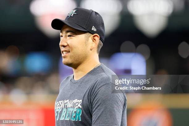 Yusei Kikuchi of the Seattle Mariners walks to the dugout before the game against the Minnesota Twins at T-Mobile Park on June 14, 2021 in Seattle,...
