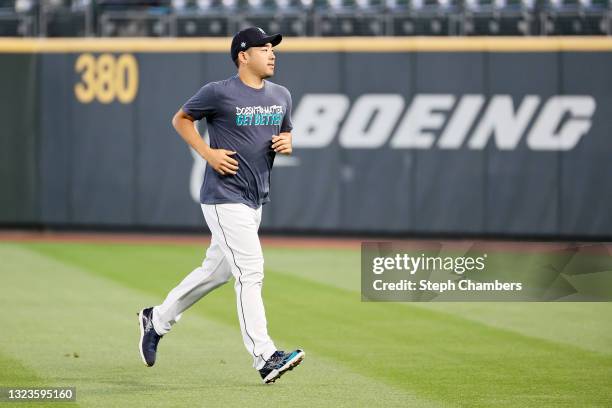 Yusei Kikuchi of the Seattle Mariners warms up before the game against the Minnesota Twins at T-Mobile Park on June 14, 2021 in Seattle, Washington.