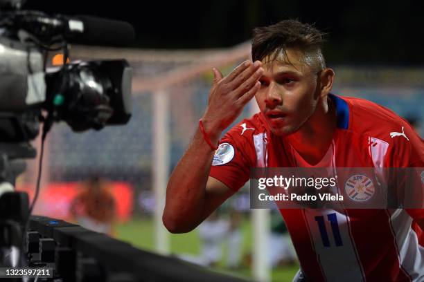 Angel Romero of Paraguay celebrates after scoring the second goal of his team during a Group A match between Paraguay and Bolivia at Estádio Olímpico...