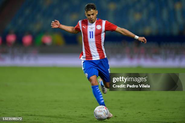 Angel Romero of Paraguay controls the ball during a Group A match between Paraguay and Bolivia at Estádio Olímpico as part of Copa America Brazil...