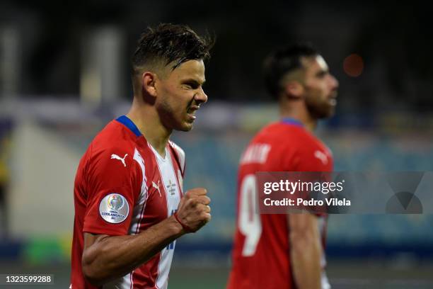 Angel Romero of Paraguay celebrates after scoring the third goal of his team during a Group A match between Paraguay and Bolivia at Estádio Olímpico...