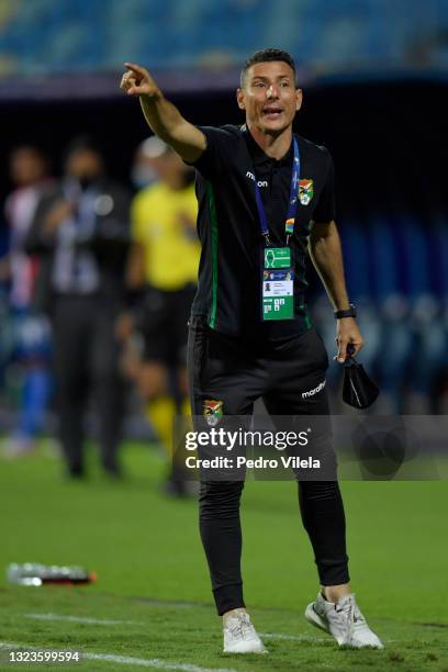 Pablo Escobar assistant coach of Bolivia gestures during a Group A match between Paraguay and Bolivia at Estádio Olímpico as part of Copa America...
