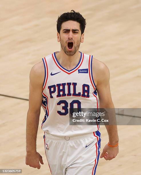 Furkan Korkmaz of the Philadelphia 76ers reacts after hitting a three-point basket against the Atlanta Hawks during the second half of game 4 of the...