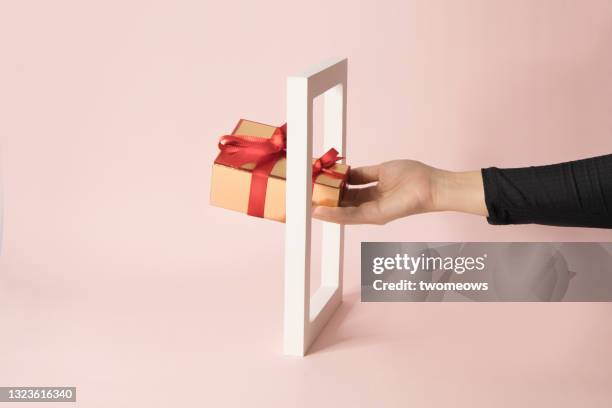 bigger rewards concepts gift box on pink background still life. - dream big foto e immagini stock