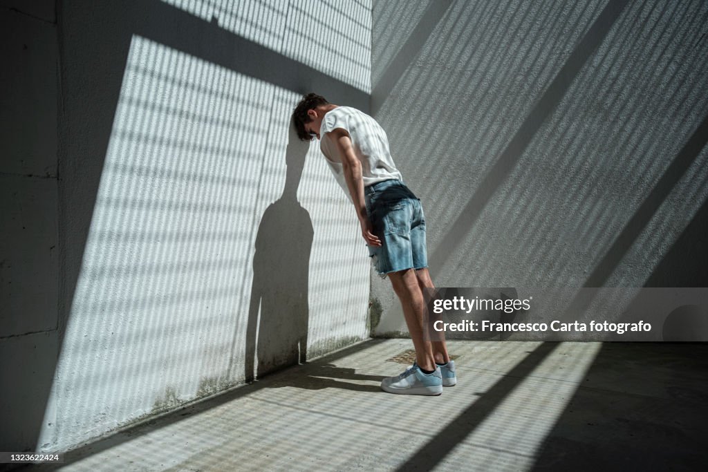 Sad Man Rear View Sadness High-Res Stock Photo - Getty Images