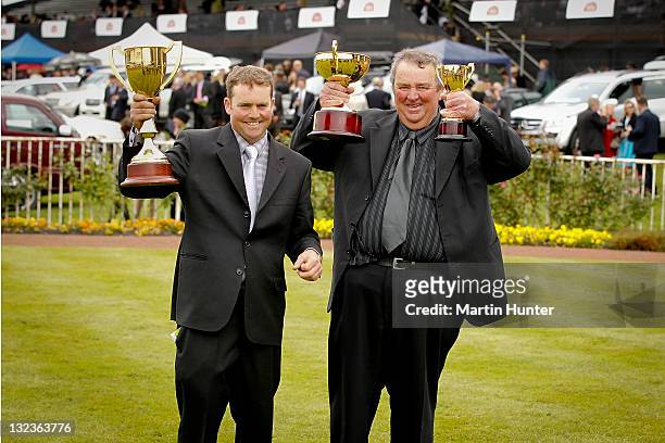 Raymond Connors poses with his father Mark Connors, owners and trainers of Blood Brotha after winning Race 8 148th NZ Cup during NZ Cup & 1000...