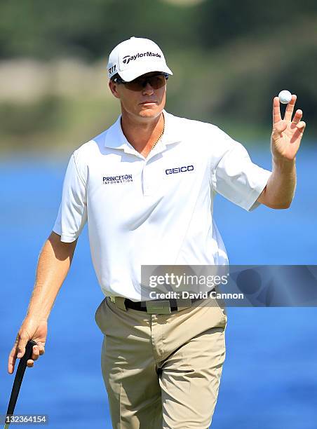 John Senden of Australia birdies the 17th hole on his way to a third round of 63 during day three of the 2011 Emirates Australian Open at The Lakes...