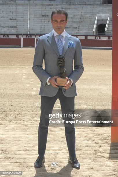 Enrique Ponce poses after receiving the special golden ear for his 30 continuous years of profession, on June 15 in Madrid, Spain.