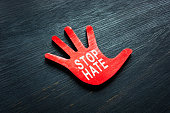 Stop hate phrase on the small hand.