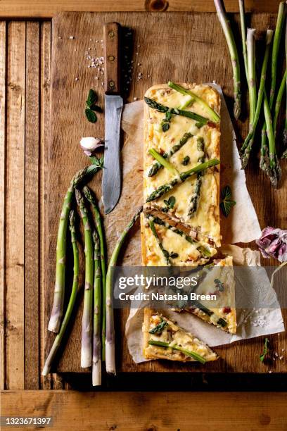 quiche lauren pie with green asparagus, cheese and bacon - flan stock pictures, royalty-free photos & images