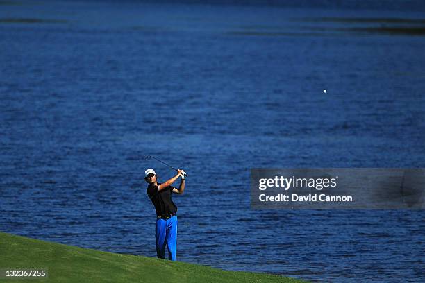 Rohan Blizard of Australia hits his second shot on the 17th hole during day three of the 2011 Emirates Australian Open at The Lakes Golf Club on...