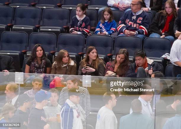 Actress Olivia Munn, Alexi Ashe, actress Jennifer Carpenter, Alexi Ashe and guest attend the Carolina Hurricanes vs the New York Rangers game at...