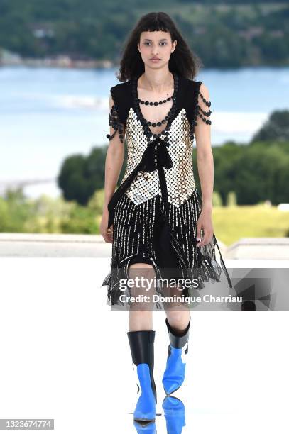 In this image released on June 15th, models walk the runway during the Louis Vuitton 2022 Cruise Collection on June 08, 2021 in Cergy, France.