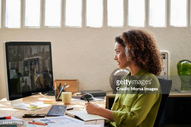 businesswoman planning strategy with colleagues - zoom video conference stock pictures, royalty-free photos & images
