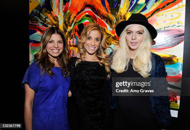 Designer/TV Personality Kathy Rose, Artist Lana Gomez and Actress Lindsay Lohan attend the Lana Gomez Art Show at Roseark on November 11, 2011 in Los...