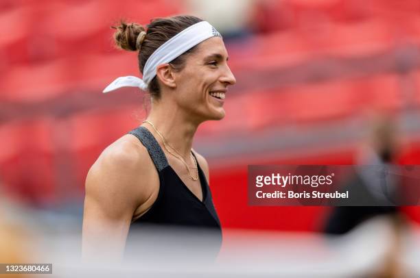 Andrea Petkovic of Germany smiles prior to the women's singles match against Victoria Azarenka of Belarus during day 4 of the bett1open at LTTC...