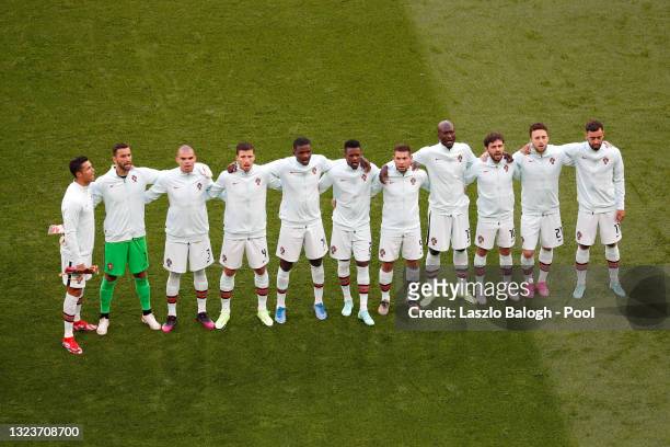 Players of Portugal stand for the national anthem prior to the UEFA Euro 2020 Championship Group F match between Hungary and Portugal at Puskas Arena...