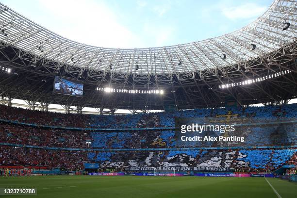 General view inside the stadium as fans raise coloured squares prior to the UEFA Euro 2020 Championship Group F match between Hungary and Portugal at...