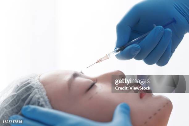 High Re Injection Do Facial Injections Of Young Women High-Res Stock Photo - Getty Images
