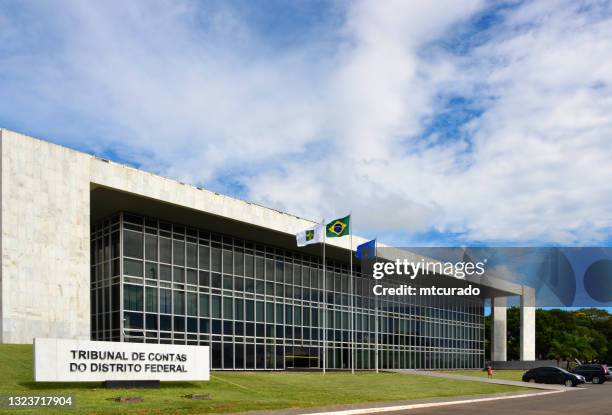 court of auditors of the federal district - flags of the federal district, brazil and the court, brasilia,  brazil - federal district stock pictures, royalty-free photos & images