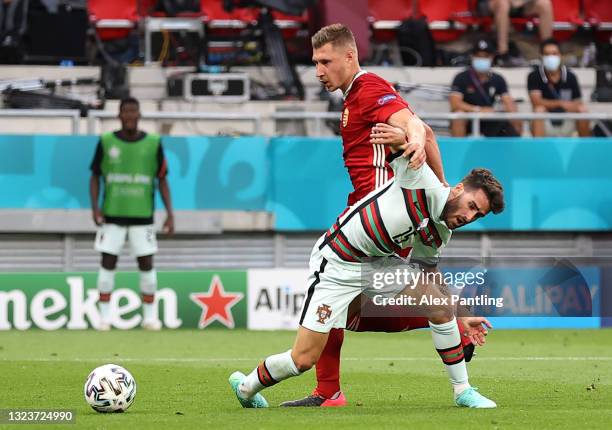 Rafa Silva of Portugal is fouled by Willi Orban of Hungary leading to a penalty being awarded during the UEFA Euro 2020 Championship Group F match...