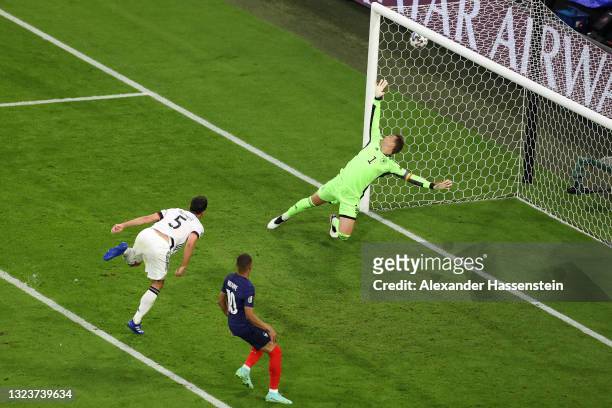 Mats Hummels of Germany scores an own goal past team mate Manuel Neuer for France's first goal during the UEFA Euro 2020 Championship Group F match...