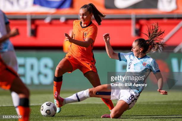 Lieke Martens of the Netherlands, Vilde Risa of Norway during the Friendly match woman match between Netherlands and Norway at Grolsch Veste on June...
