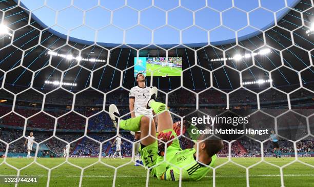 Mats Hummels of Germany looks dejected after scoring an own goal past team mate Manuel Neuer during the UEFA Euro 2020 Championship Group F match...