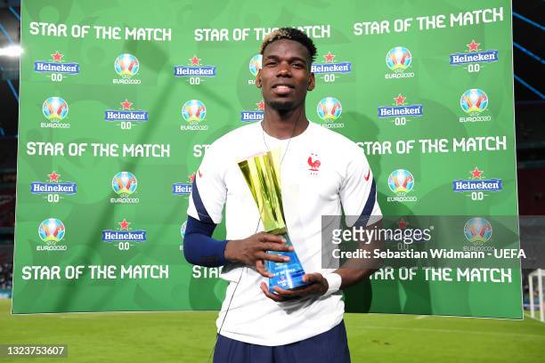 Paul Pogba of France poses for a photograph with their Heineken "Star of the Match" award after the UEFA Euro 2020 Championship Group F match between...