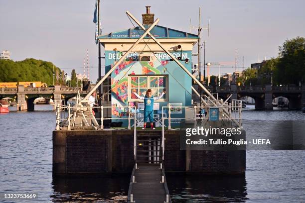 The Euro 2020 football tournament mascot Skillzy pose at De Leukste Huiskamer, a Lock Keepers building painted in the Euro 2020 colours and logo,...