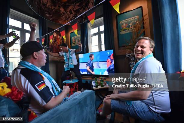 Contest winners fans of Germany are host inside of De Leukste Huiskamer, a Lock Keepers building painted in the Euro 2020 colours and logo, during...