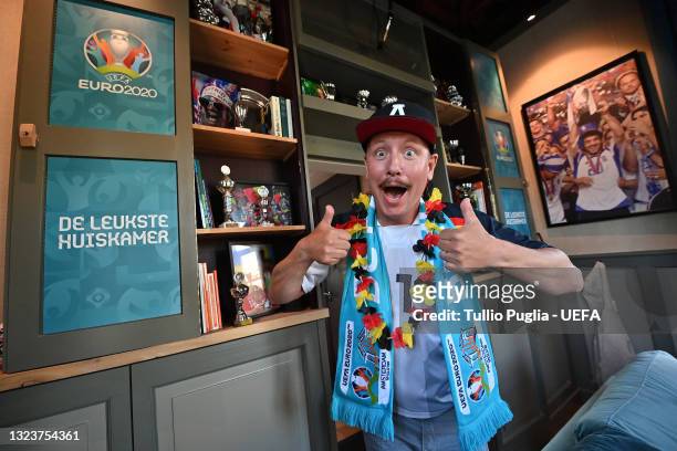 Contest winner fan of Germany is hosts inside of De Leukste Huiskamer, a Lock Keepers building painted in the Euro 2020 colours and logo, during the...