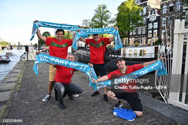 Contest winners, fans of Portugal, are host at De Leukste Huiskamer, a Lock Keepers building painted in the Euro 2020 colours and logo, during the...