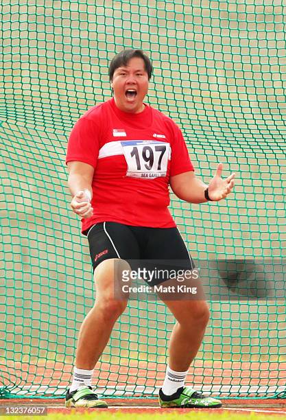 James Wong of Singapore shouts while competing in the Mens Discus on day two of the 2011 Southeast Asian Games at Jakabaring Sports Complex on...