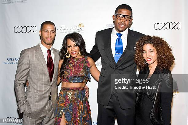 Jannero Pargo, Malaysia Pargo, Joe Johnson and guest attend the 3 Beats launch party at the W Hotel Chicago on November 11, 2011 in Chicago, Illinois.