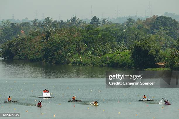 Competitors leave the start gates during the 500m K2 Women's Final on day two of the 2011 Southeast Asian Games at Cipule Regatta Course on November...