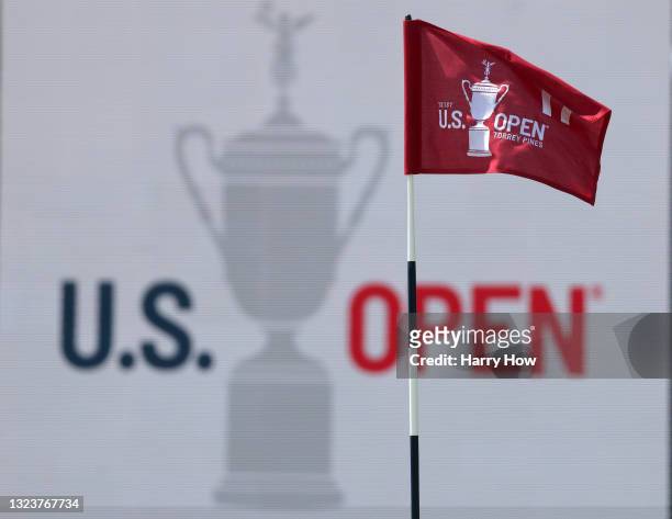 General view of a flag and signage is seen on the 17th green during a practice round prior to the start of the 2021 U.S. Open at Torrey Pines Golf...