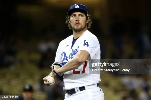 Trevor Bauer of the Los Angeles Dodgers looks on after giving up a hit to Joey Gallo of the Texas Rangers during the fifth inning at Dodger Stadium...
