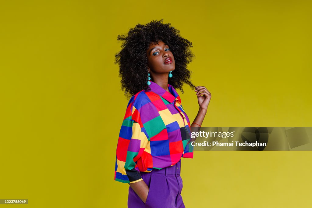 Fashionable woman in colorful shirt
